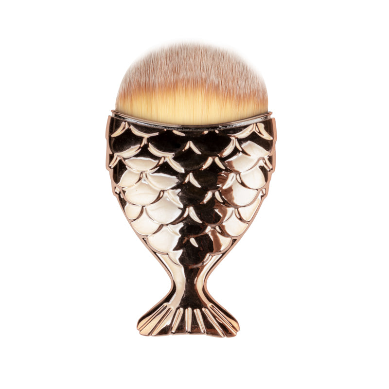 Gold fish-shaped dust brush with soft bristles