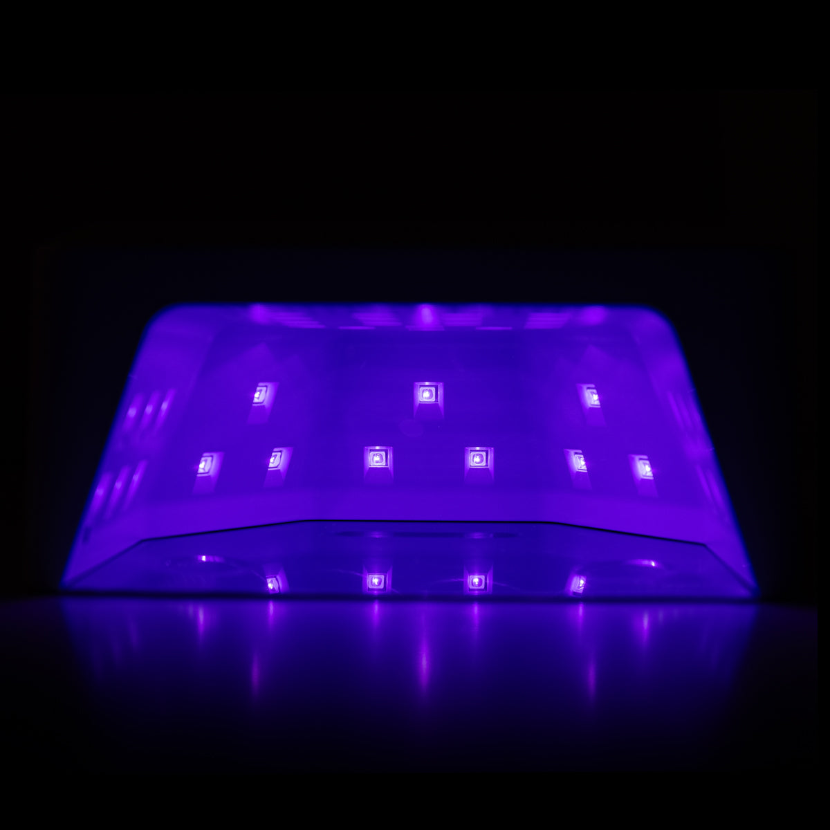 Glow 112 nail lamp with power adapter and packaging