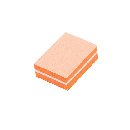 Ocho Nails mini buffer block size shown in the hand