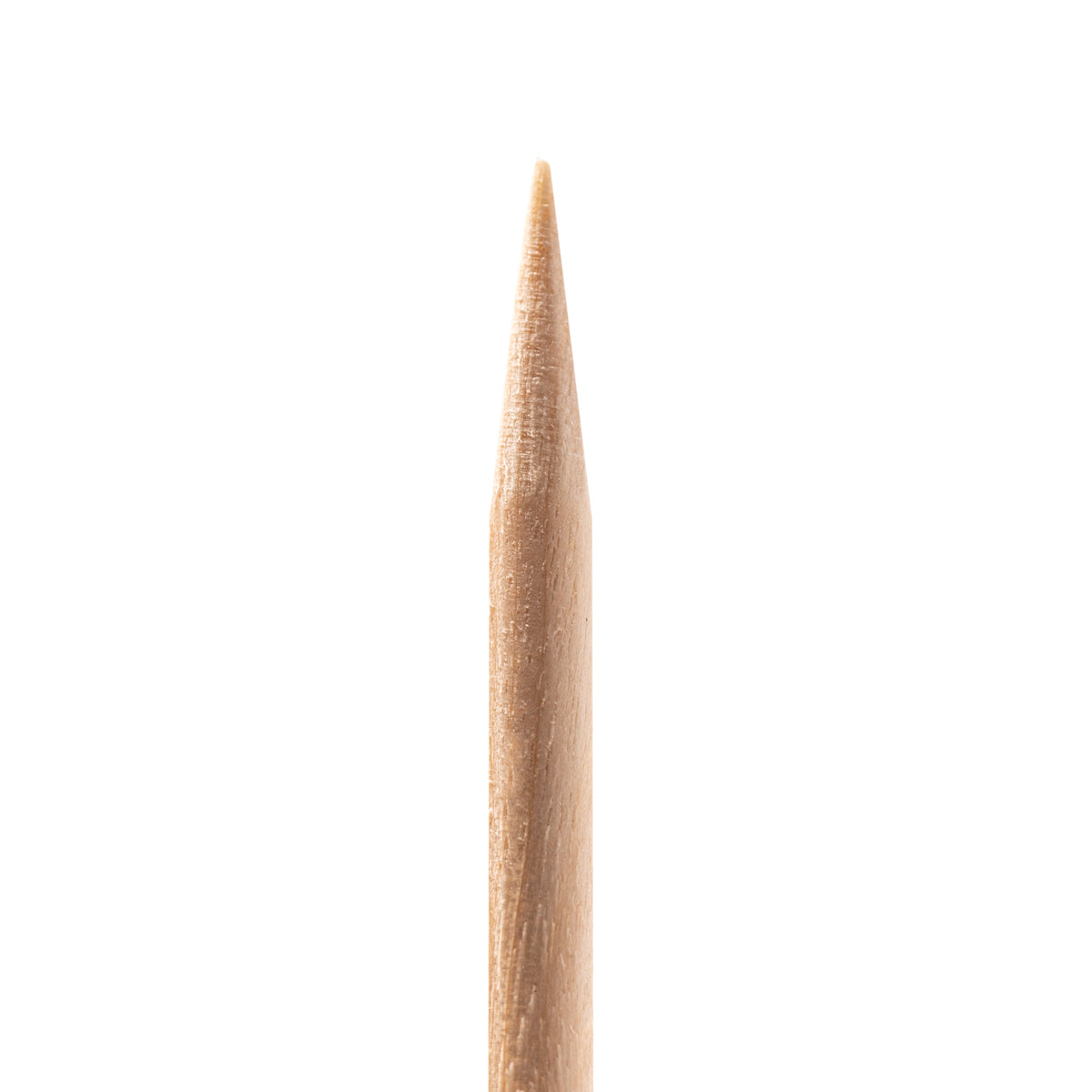 Pointed end of an Ocho Nails wooden cuticle stick for cleaning under the nail
