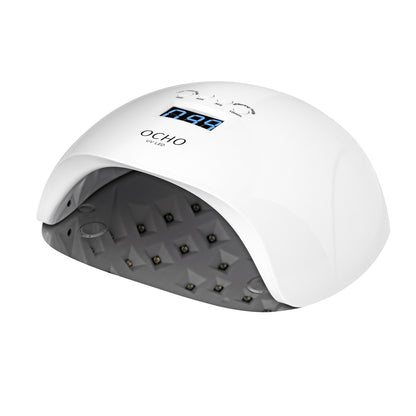 Ocho Nails X13 Plus nail lamp front view with the curing chamber open